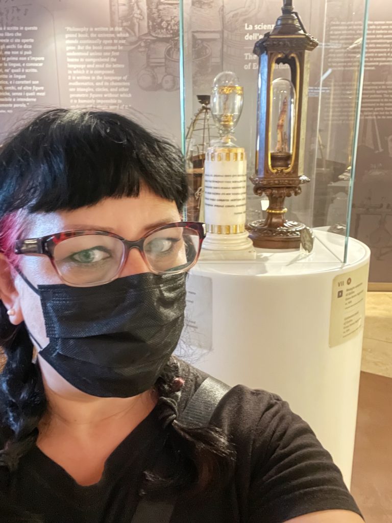 Liisa with Galileo's finger display in Florence Italy